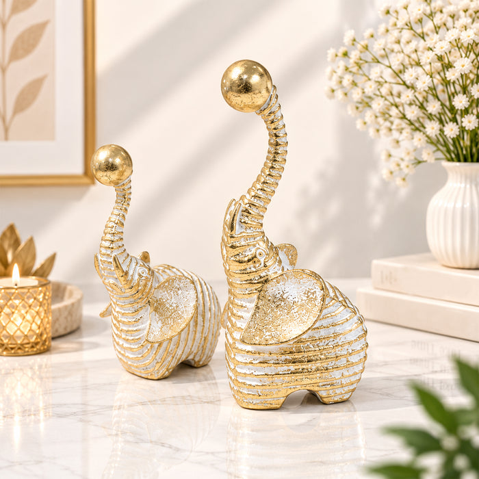 Set of 2 White & Gold Textured Resin Trunk Up Elephant Figurines, Decorative Tabletop Accent Statues for Home Decor (21x9 cm)