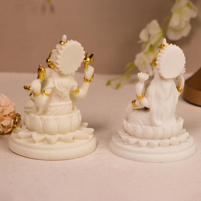 Laxmi Ji and Ganesh Ji Statue Showpiece Idol, Crafted from Marble Finish Laxmi Ji and Ganesh Ji Murti  (White, 9x11 cm)