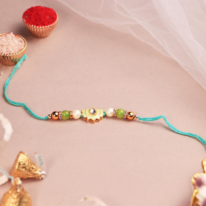 Rakhi Set for Brother and Bhabhi Premium Lotus Flowers Rakhi with Roli and Chawal for Raksha Bandhan (Set of 5)