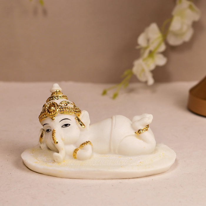 Resting Ganesha Statue Showpiece Idol, Crafted from Marble Finish Resting Ganesha Murti (White, 7x13 cm)