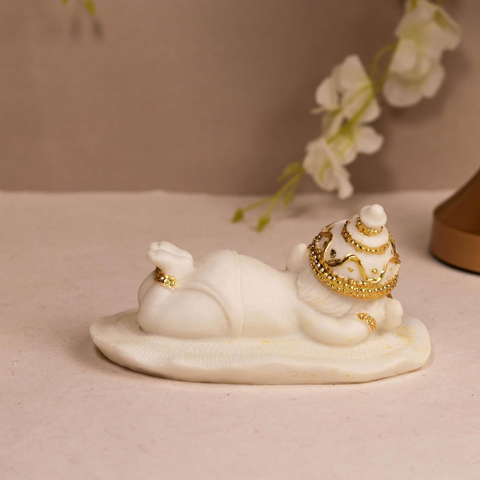Resting Ganesha Statue Showpiece Idol, Crafted from Marble Finish Resting Ganesha Murti (White, 7x13 cm)