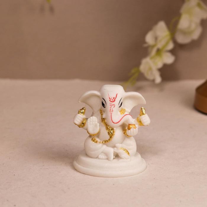Ganesh Ji Statue Showpiece Idol, Crafted from Marble Finish Ganesh Ji Murti (White, 6x7 cm)