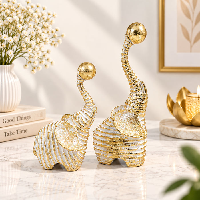 Set of 2 White & Gold Textured Resin Trunk Up Elephant Figurines, Decorative Tabletop Accent Statues for Home Decor (21x9 cm)