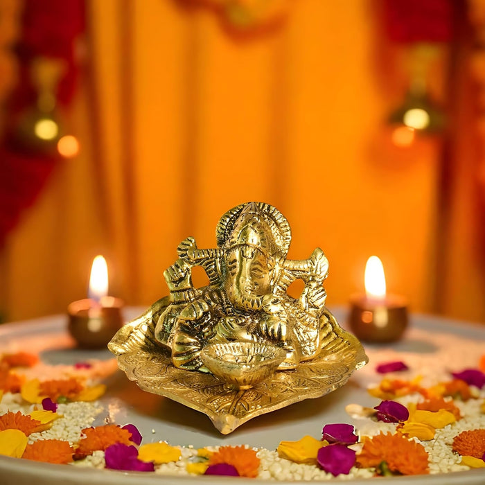Mental Ganesha Idol on Peepal Leaf with Diya Oil Lamp, Diwali Pooja Decoration Items, Brass Finished Idols for Deepawali Decor Oil Lamp 8.9x5.8 cm