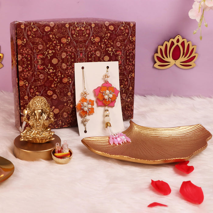 Rakshabandhan Gift Hamper for Brother and Bhabhi, Plate and Shree Ganesh Ji Idol, Flowers Design Rakhi with Chawal and Roli Gift Set for Celebrate Raksha Bandhan
