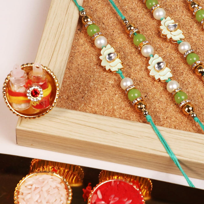 Rakhi Set for Brother and Bhabhi Premium Lotus Flowers Rakhi with Roli and Chawal for Raksha Bandhan (Set of 5)
