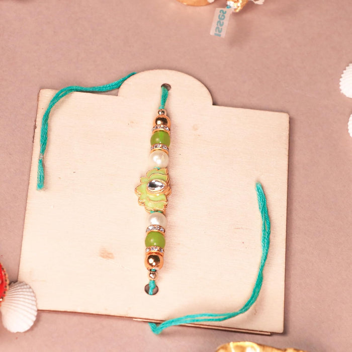 Art Street Rakshabandhan Gift Hamper with Sweets for Brother and Bhabhi, Megantice Photo Frame and Lotus Flowers Rakhi with Chawal and Roli Gift Set for Celebrate Raksha Bandhan (Pack of 7 Items)