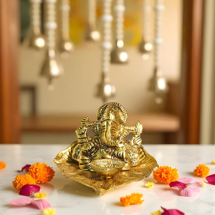 Mental Ganesha Idol on Peepal Leaf with Diya Oil Lamp, Diwali Pooja Decoration Items, Brass Finished Idols for Deepawali Decor Oil Lamp 8.9x5.8 cm