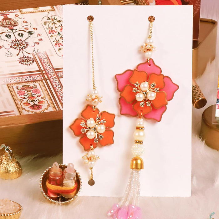 Rakhi Set for Brother and Bhabhi Premium Pink Flowers Design Rakhi with Roli and Chawal for Raksha Bandhan (Combo Of Two Rakhi)