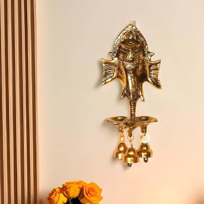 Metal Wall Hanging Ganesha Brass Finished Idol with 3 Diya Oil Lamp and 3 Bells Traditional Diwali Decoration, Brass Finished, Handcrafted Ganesha, 9.7x19 cm