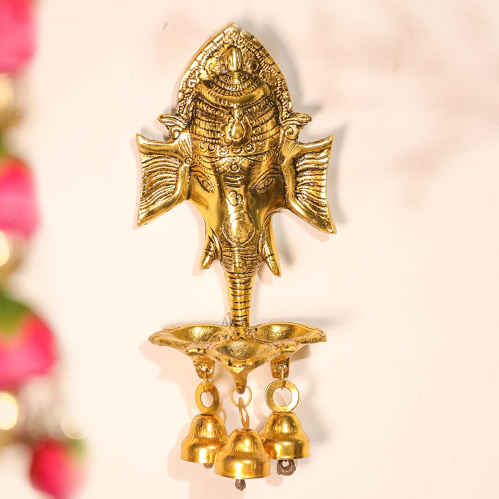 Metal Wall Hanging Ganesha Brass Finished Idol with 3 Diya Oil Lamp and 3 Bells Traditional Diwali Decoration, Brass Finished, Handcrafted Ganesha, 9.7x19 cm