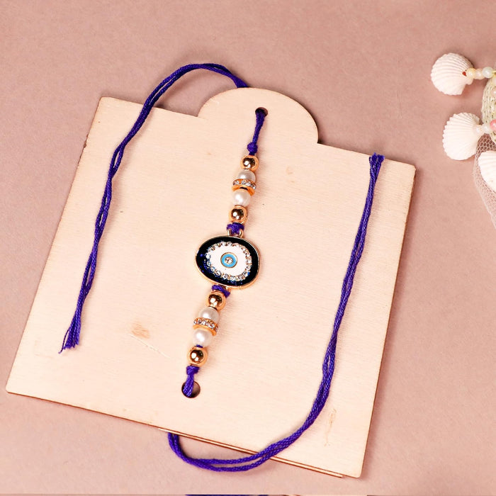 Art Street Rakshabandhan Gift Hamper with Sweets for Brother and Bhabhi, Megantice and acrylic photo frame, Evil Eye Rakhi with Chawal and Roli Gift Set for Celebrate Raksha Bandhan (Pack of 7 Items)