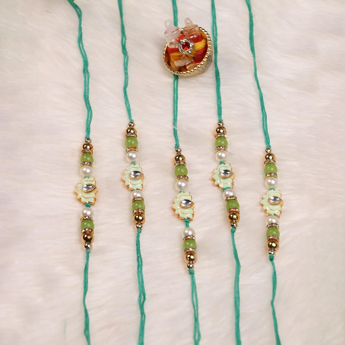 Rakhi Set for Brother and Bhabhi Premium Lotus Flowers Rakhi with Roli and Chawal for Raksha Bandhan (Set of 5)
