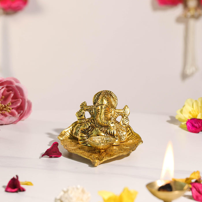 Mental Ganesha Idol on Peepal Leaf with Diya Oil Lamp, Diwali Pooja Decoration Items, Brass Finished Idols for Deepawali Decor Oil Lamp 8.9x5.8 cm