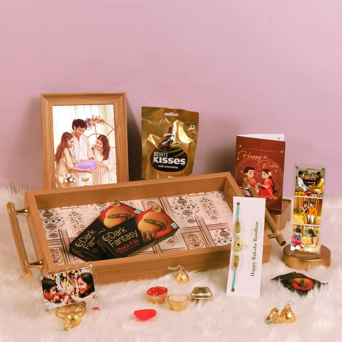 Rakshabandhan Chocolate Gift Hamper for Brother and Bhabhi, Photo Frame and Serving Tray, Lotus Rakhi with Chawal and Roli Gift Set for Celebrate Raksha Bandhan