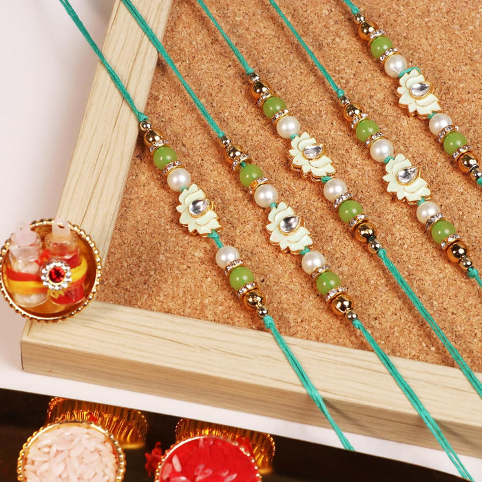 Rakhi Set for Brother and Bhabhi Premium Lotus Flowers Rakhi with Roli and Chawal for Raksha Bandhan (Set of 5)