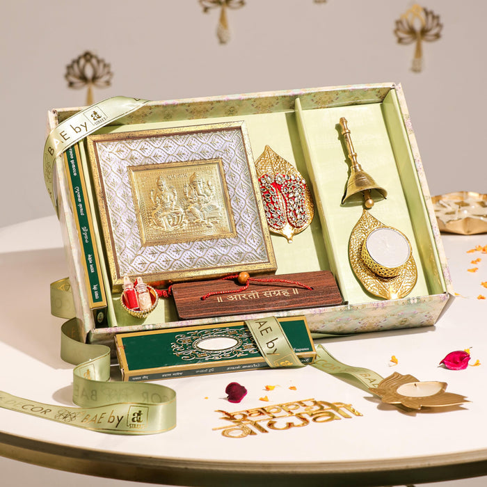 Pooja Hamper Box with Laxmi Ganesh Frame, Laxmi Charan, Aarti Sangrah, Ghanti, Agarbatti and Candle for Diwali Celebration and Gift for Family, Friends and Relatives (Pack of 7)