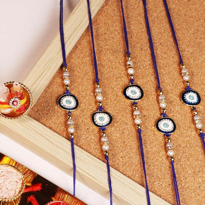 Rakhi Set for Brother and Bhabhi Premium Nazariya Rakhi with Roli and Chawal for Raksha Bandhan (Set of 5)