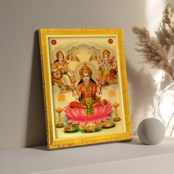 Divine Lakshmi Ganesh Saraswathi Goddess of Wealth Religious Golden Photo Frame Stand able and Wall Hanging for Temple, Mandir (21x30 cm)