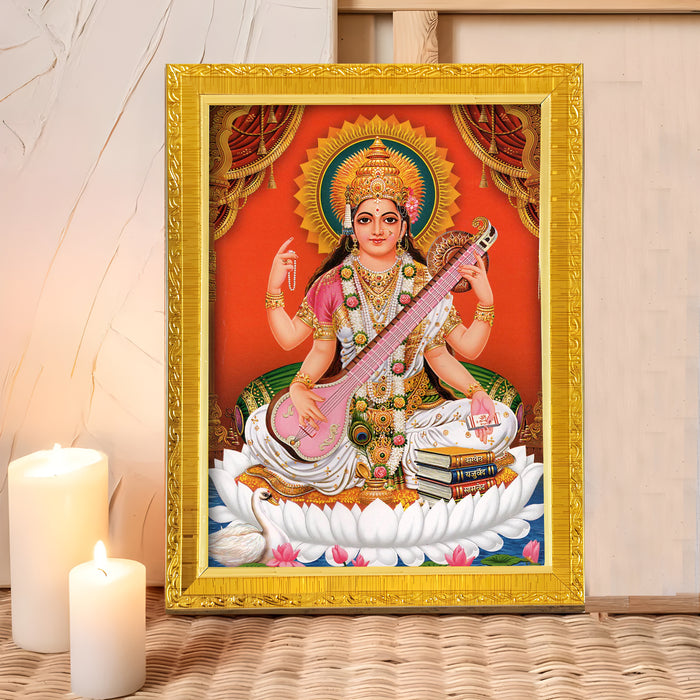 Divine Lakshmi Ganesh Saraswathi Goddess of Wealth Religious Golden Photo Frame Stand able and Wall Hanging for Temple, Mandir (21x30 cm)