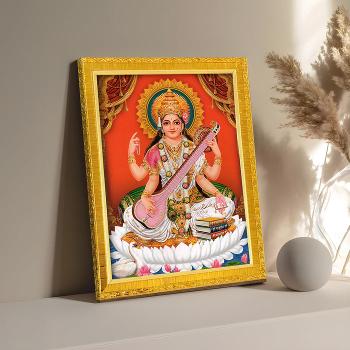 Divine Lakshmi Ganesh Saraswathi Goddess of Wealth Religious Golden Photo Frame Stand able and Wall Hanging for Temple, Mandir (21x30 cm)